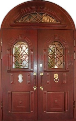 Стальная арочная дверь со стеклом и ковкой ДА-30 в дом из кирпича Кириши