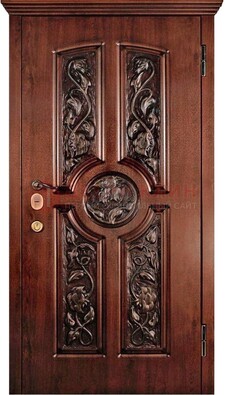 Филенчатая металлическая дверь с виноритом и резьбой ДВТ-69 Кириши